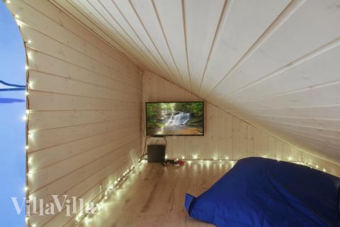 Några av de 28 sovplatserna finns på loftet i lyxstuga nr 423