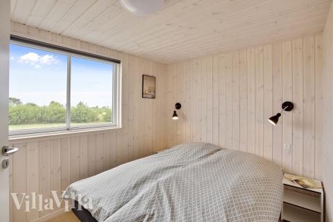 Ett av de 12 utmärkta sovrummen i lyxstuga nr 430 i Fyn och öar.