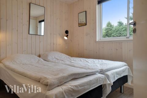 Ett av de 6 utmärkta sovrummen i lyxstuga nr 426 i Nordsjälland.