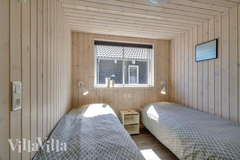 Ett av de 6 utmärkta sovrummen i lyxstuga nr 717 i Tyskland.