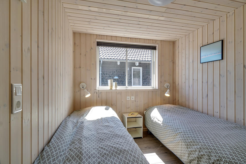 Ett av de 6 utmärkta sovrummen i lyxstuga nr 717 i Tyskland.