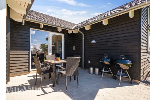 Njut av en grillkväll på terrassen i lyxstuga nr 717 i Tyskland