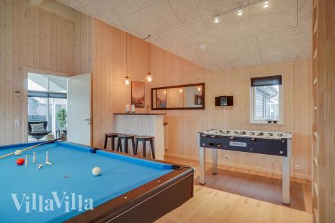 Aktivitetsrum i lyxstuga nr 723 med 4 sovrum och plats för 10 personer.