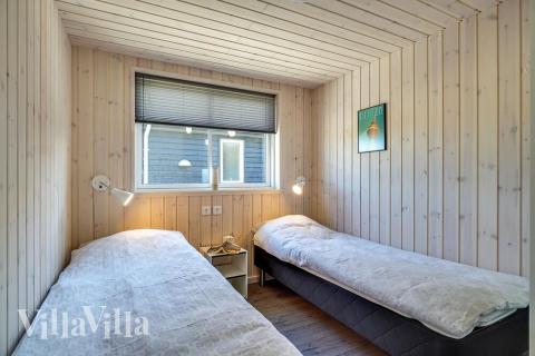 Ett av de 6 utmärkta sovrummen i lyxstuga nr 716 i Tyskland.