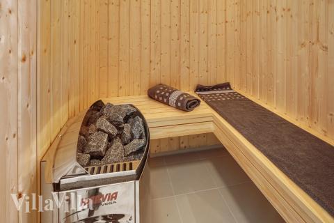 Njut av bastuvärmen i lyxstuga nr 722 för 10 personer