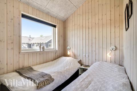 Ett av de 4 utmärkta sovrummen i lyxstuga nr 718 i Tyskland.