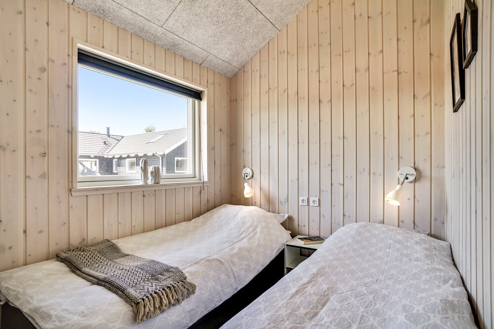 Ett av de 4 utmärkta sovrummen i lyxstuga nr 718 i Tyskland.