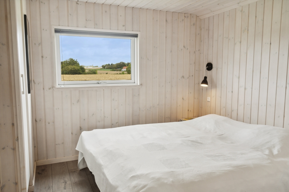 Ett av de 5 utmärkta sovrummen i lyxstuga nr 427 i Lolland/Falster/Møn.