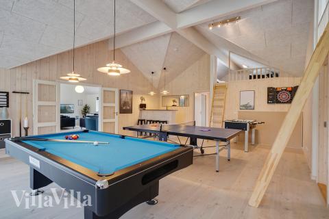 Aktivitetsrum i lyxstuga nr 429 med 12 sovrum och plats för 30 personer.