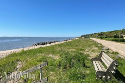 Stranden i närheten av lyxhus 429.