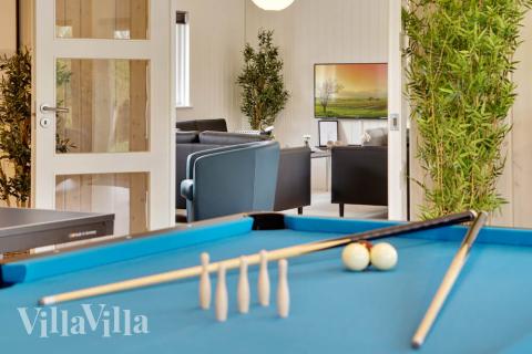 Tävla i sommarhusets aktivitetsrum när ni besöker lyxhus nr 431 i Limfjorden.