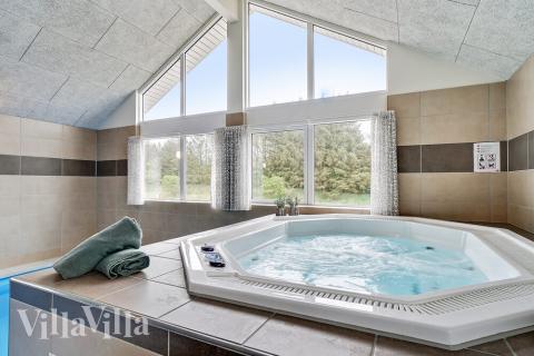 Lyxstuga nr 431 erbjuder bland annat ett härligt spabad