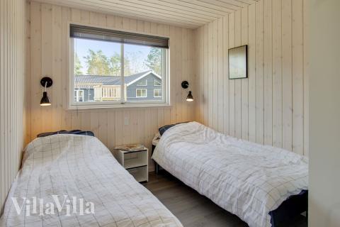 Ett av de 7 utmärkta sovrummen i lyxstuga nr 435 i Nordsjälland.