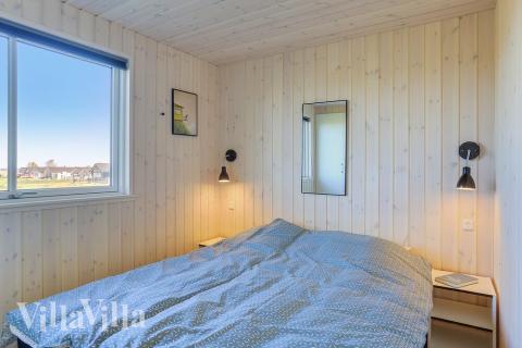 Ett av de 12 utmärkta sovrummen i lyxstuga nr 428 i Fyn och öar.