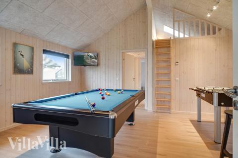 Aktivitetsrum i lyxstuga nr 724 med 4 sovrum och plats för 10 personer.