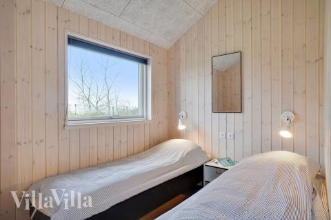 Ett av de 4 utmärkta sovrummen i lyxstuga nr 724 i Tyskland.