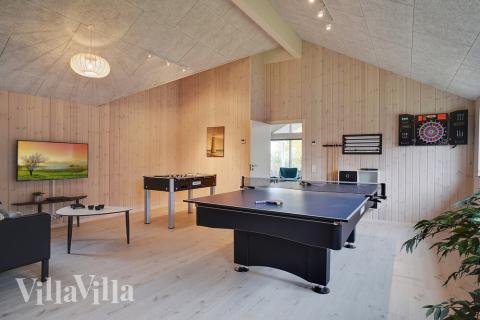 Aktivitetsrum i lyxstuga nr 721 med 7 sovrum och plats för 18 personer.