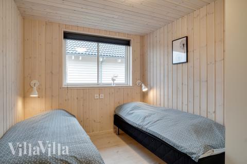 Ett av de 7 utmärkta sovrummen i lyxstuga nr 721 i Tyskland.