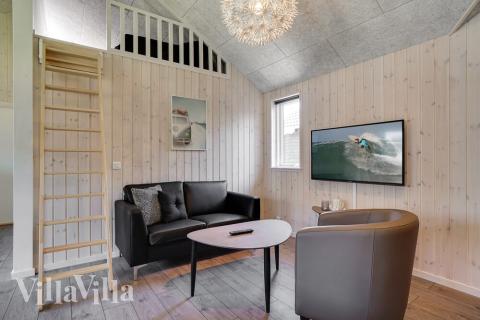 Aktivitetsrum i lyxstuga nr 720 med 7 sovrum och plats för 18 personer.