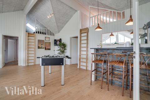 Tävla i sommarhusets aktivitetsrum när ni besöker lyxhus nr 441 i Østjylland.