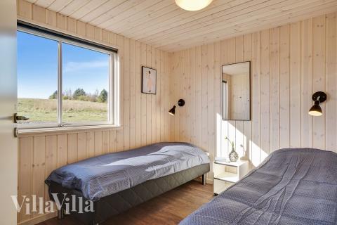 Ett av de 12 utmärkta sovrummen i lyxstuga nr 450 i Østjylland.