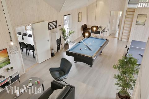 Tävla i sommarhusets aktivitetsrum när ni besöker lyxhus nr 432 i Lolland/Falster/Møn.