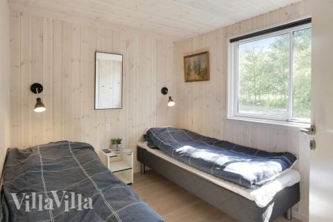 Ett av de 6 utmärkta sovrummen i lyxstuga nr 433 i Lolland/Falster/Møn.