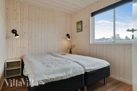 Ett av de 7 utmärkta sovrummen i lyxstuga nr 437 i Fyn och öar.