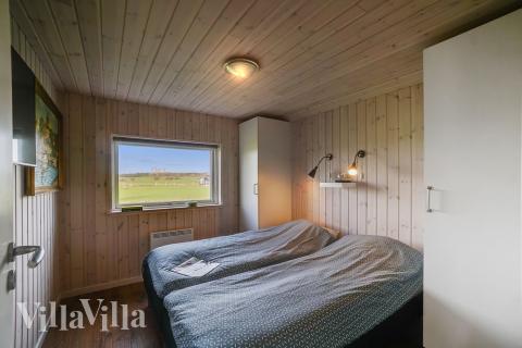 Ett av de 4 utmärkta sovrummen i lyxstuga nr 443 i Østjylland.