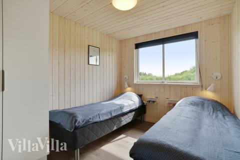 Ett av de 8 utmärkta sovrummen i lyxstuga nr 453 i Vestjylland.