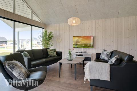 Tävla i sommarhusets aktivitetsrum när ni besöker lyxhus nr 454 i Vestjylland.