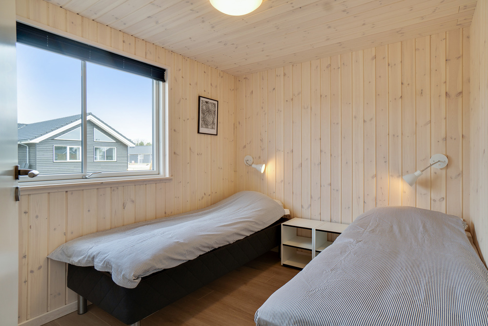 Ett av de 8 utmärkta sovrummen i lyxstuga nr 456 i Vestjylland.