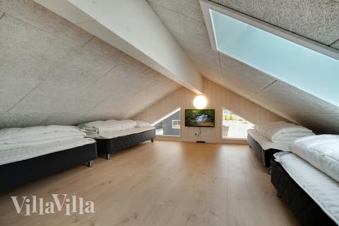 Några av de 20 sovplatserna finns på loftet i lyxstuga nr 457