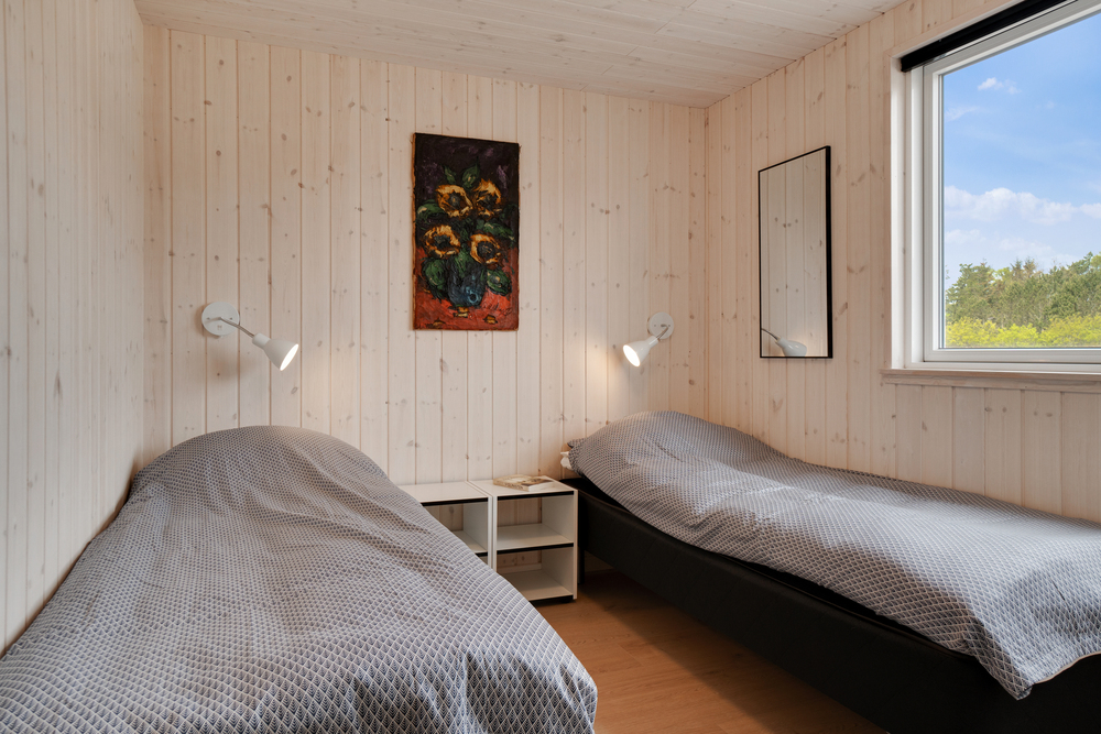 Ett av de 8 utmärkta sovrummen i lyxstuga nr 457 i Vestjylland.