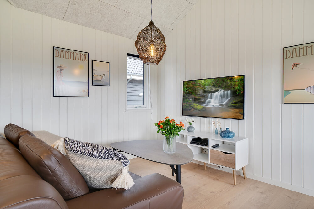 Tävla i sommarhusets aktivitetsrum när ni besöker lyxhus nr 458 i Vestjylland.