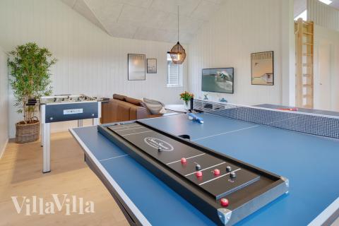 Aktivitetsrum i lyxstuga nr 458 med 7 sovrum och plats för 18 personer.