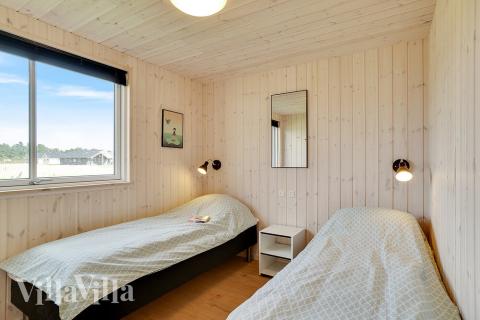 Ett av de 7 utmärkta sovrummen i lyxstuga nr 458 i Vestjylland.