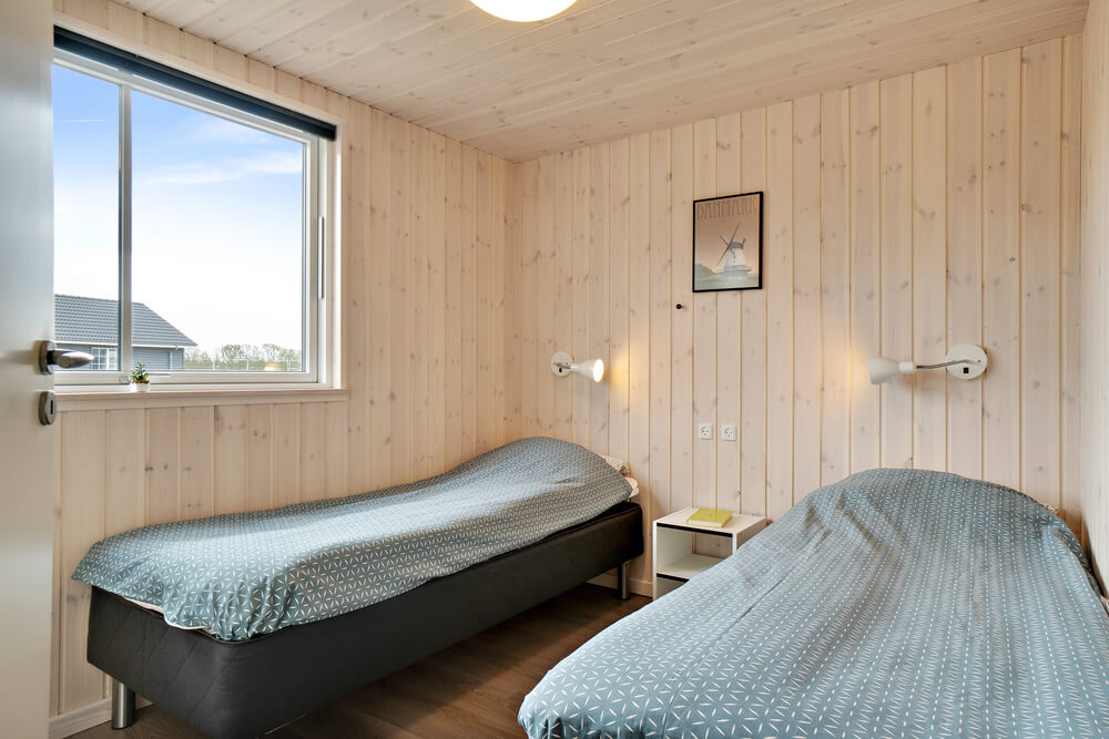 Ett av de 8 utmärkta sovrummen i lyxstuga nr 463 i Vestjylland.