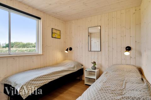Ett av de 7 utmärkta sovrummen i lyxstuga nr 473 i Vestjylland.