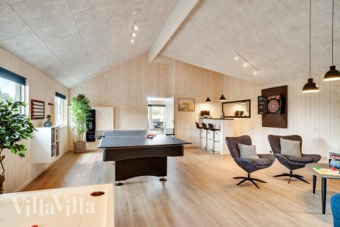 Aktivitetsrum i lyxstuga nr 473 med 7 sovrum och plats för 18 personer.