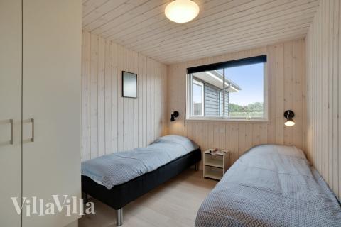 Ett av de 12 utmärkta sovrummen i lyxstuga nr 467 i Vestjylland.