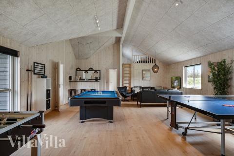 Aktivitetsrum i lyxstuga nr 461 med 9 sovrum och plats för 24 personer.