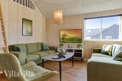 Tävla i sommarhusets aktivitetsrum när ni besöker lyxhus nr 447 i Lolland/Falster/Møn.