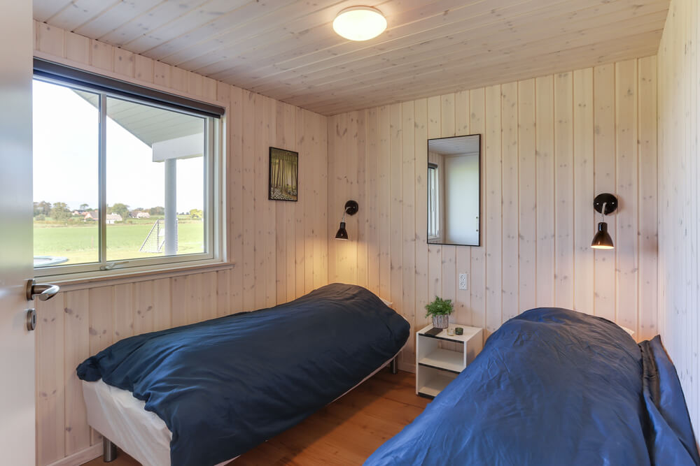 Ett av de 9 utmärkta sovrummen i lyxstuga nr 447 i Lolland/Falster/Møn.