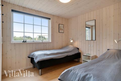 Ett av de 8 utmärkta sovrummen i lyxstuga nr 465 i Vestjylland.