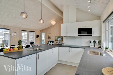 Köket i lyxstuga nr 465 är utrustat så att ni kan laga mat till 20 personer.