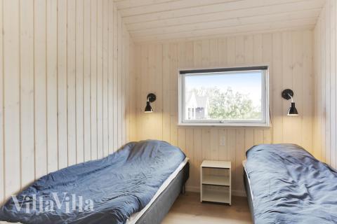 Ett av de 5 utmärkta sovrummen i lyxstuga nr 452 i Lolland/Falster/Møn.