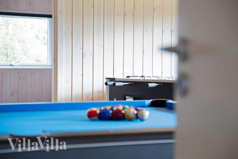 Aktivitetsrum i lyxstuga nr 452 med 5 sovrum och plats för 14 personer.