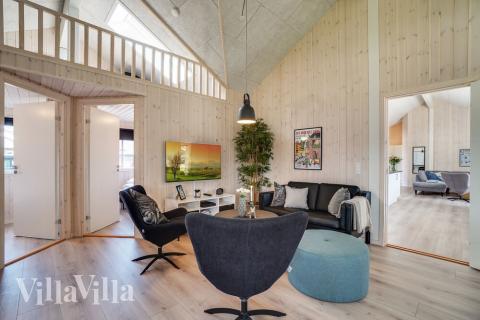 Tävla i sommarhusets aktivitetsrum när ni besöker lyxhus nr 451 i Østjylland.