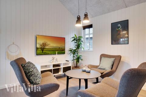 Tävla i sommarhusets aktivitetsrum när ni besöker lyxhus nr 460 i Vestjylland.